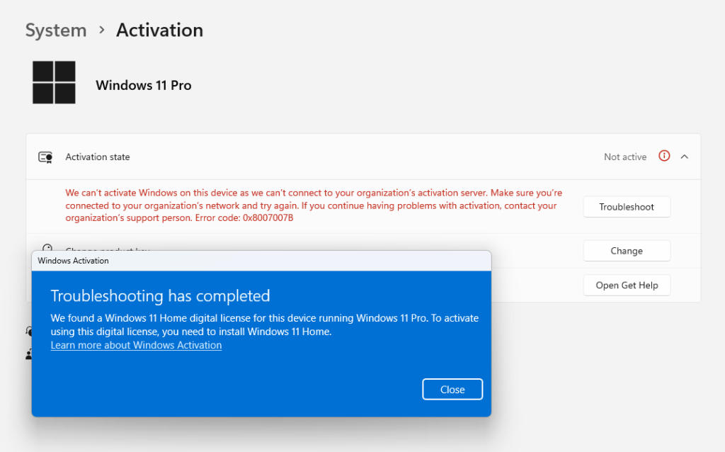 Windows 11 aktyvavimo klaidos pranešimas su rekomenduojamu problemų sprendimo įrankiu